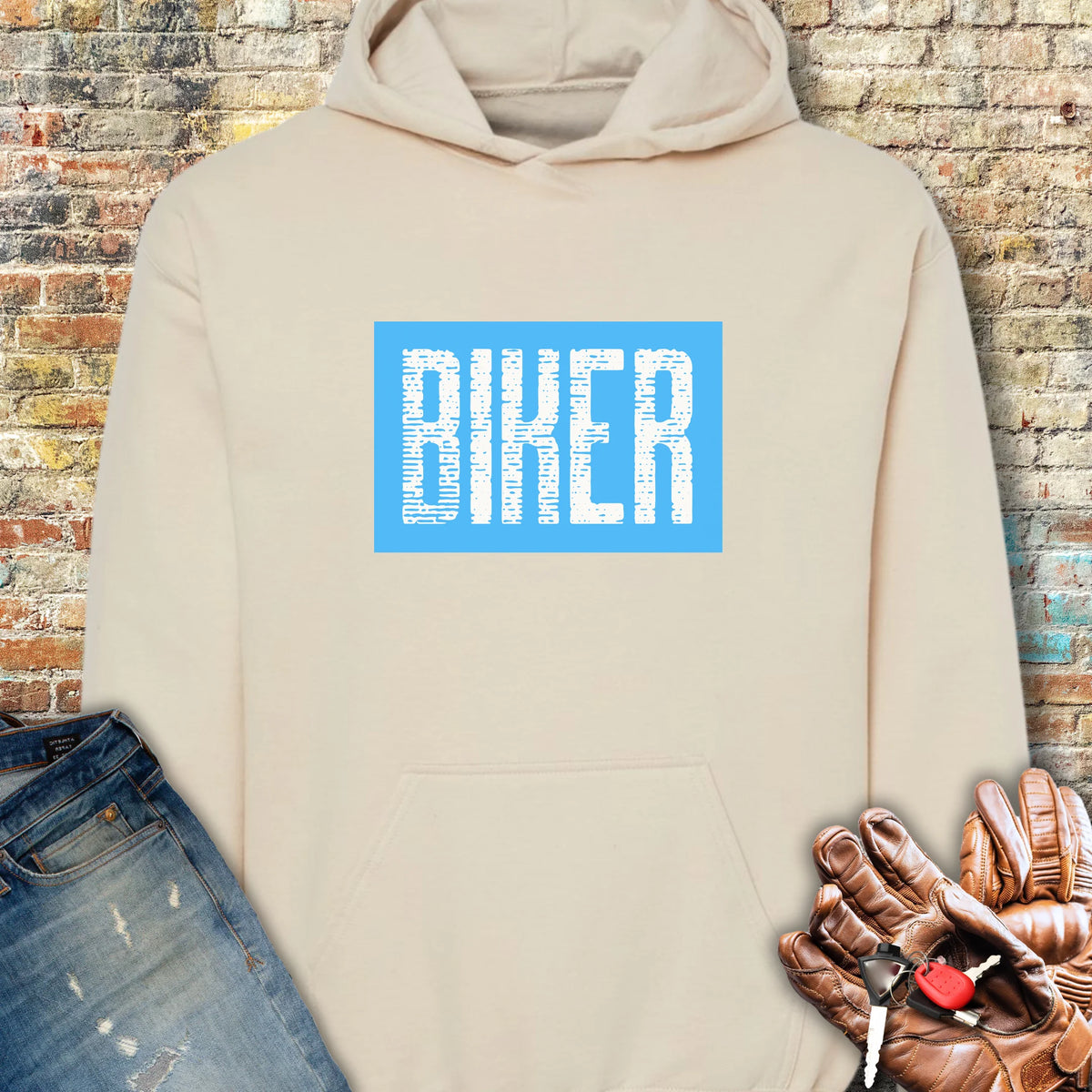 Biker In Blue Hoodie - Sand